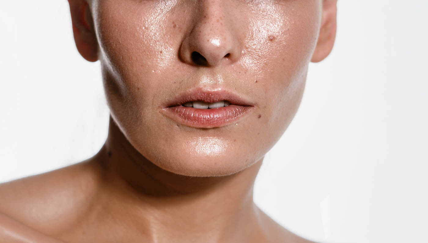 Skin concerns on face: acne, uneven tone, fine lines, and wrinkles - Illumia Medical
